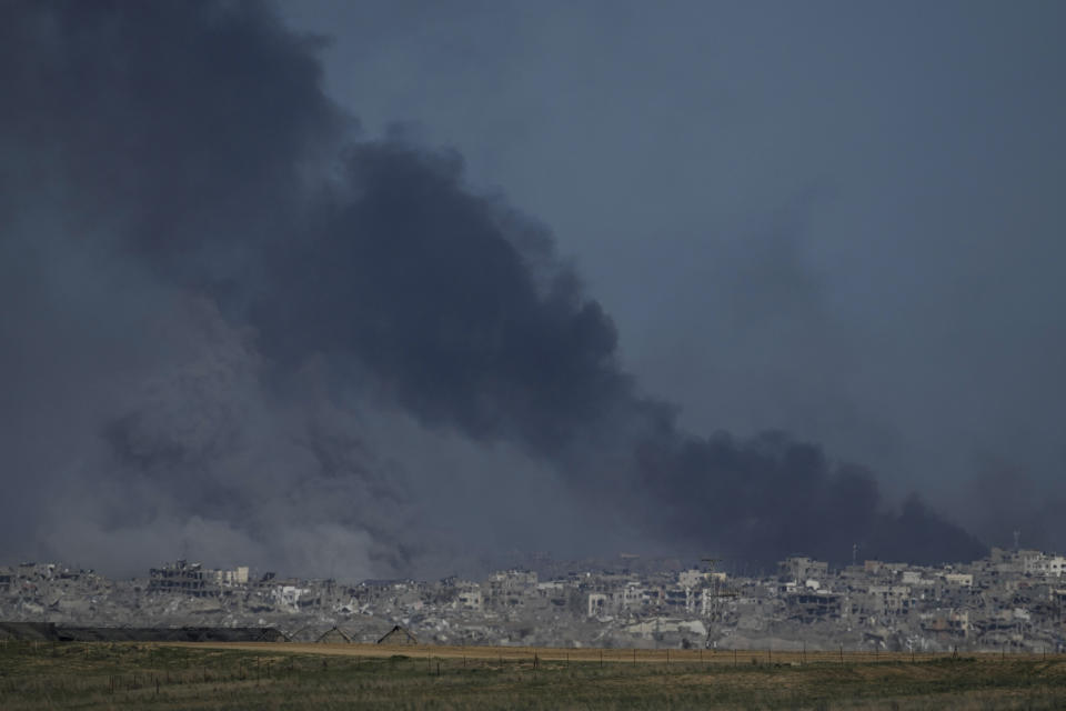 Smoke rises following an Israeli bombardment in the Gaza Strip, as seen from southern Israel, Tuesday, Dec. 26, 2023. The army is battling Palestinian militants across Gaza in the war ignited by Hamas' Oct. 7 attack into Israel. (AP Photo/Leo Correa)