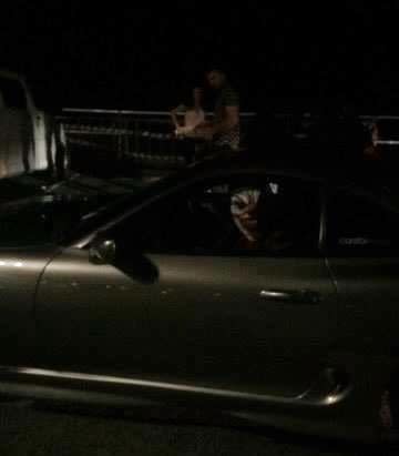 A clown sits in the passenger seat of a car, reportedly in Bondi. Photo: Facebook