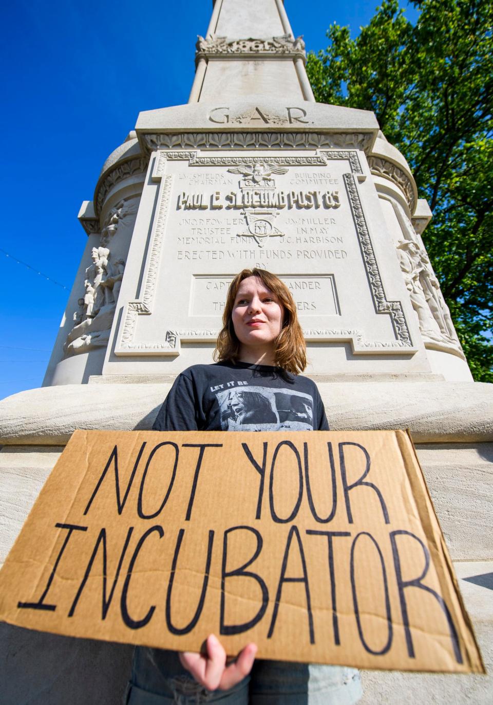 Nicole Wilmer holds a sign during the Bans Off Our Bodies rally at the Monroe County courthouse on Saturday, May 14, 2022.