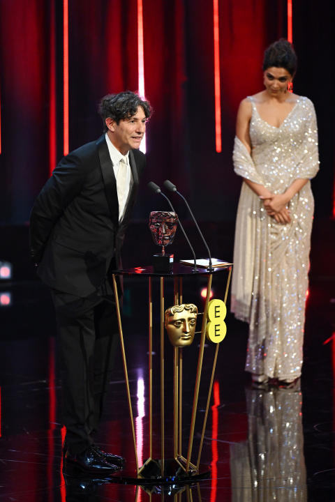 LONDON, ENGLAND - FEBRUARY 18: Jonathan Glazer accepts the Film Not in the English Language Award for 'The Zone of Interest' on stage during the EE BAFTA Film Awards 2024 at The Royal Festival Hall on February 18, 2024 in London, England. (Photo by Joe Maher/BAFTA/Getty Images for BAFTA)