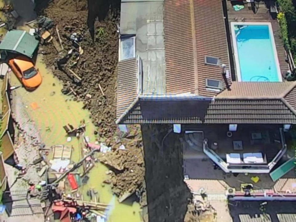 Undated handout photo of a family home that had been teetering on the edge after a cliff collapse: PA