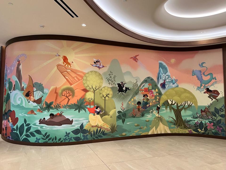 There's an Easter egg in the mural by Disney Animation artist and associate production designer Lorelay Bové at The Villas at Disneyland Hotel. The star from Disney's upcoming film "Wish" is among the many characters.