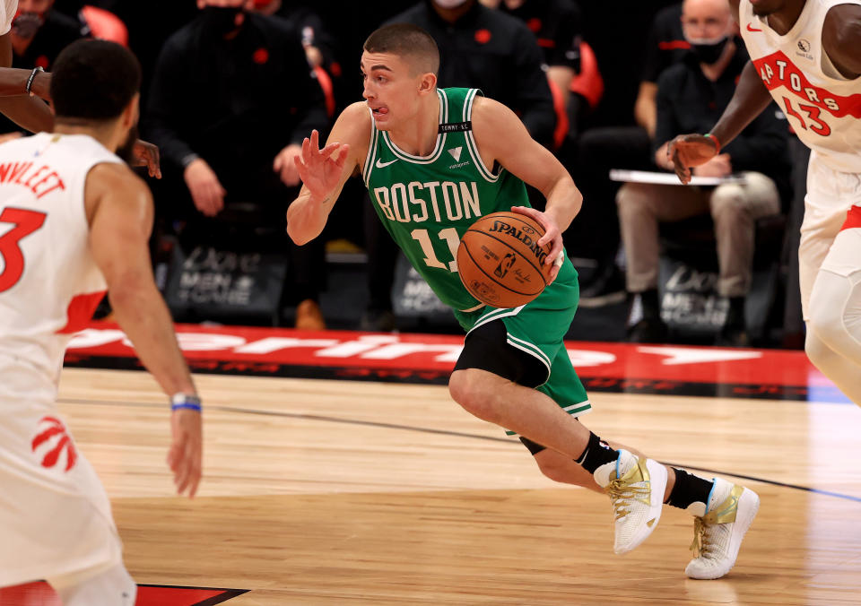 Payton Pritchard #11 of the Boston Celtics drives during a game against the Toronto Raptors at Amalie Arena on January 04, 2021 in Tampa, Florida.