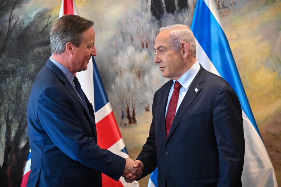 Lord Cameron and Benjamin Netanyahu shake hands (EPA)