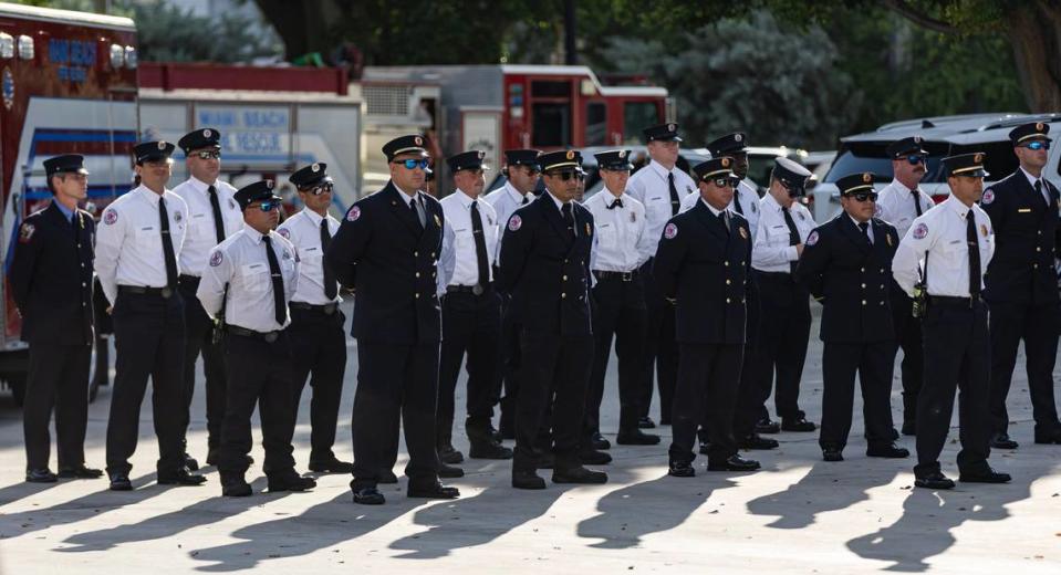 Miami Beach Firefighters attend a September 11, 2001, remembrance ceremony at Fire Station 2 on Monday, Sept. 11, 2023, in Miami Beach, Fla.