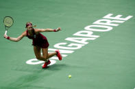 Tennis - WTA Tour Finals - Singapore Indoor Stadium, Kallang, Singapore - October 22, 2018 Kiki Bertens of the Netherlands in action during her group stage match against Germany's Angelique Kerber REUTERS/Edgar Su