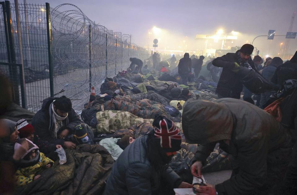 Migrants gathered at a checkpoint at the Belarus-Poland border.