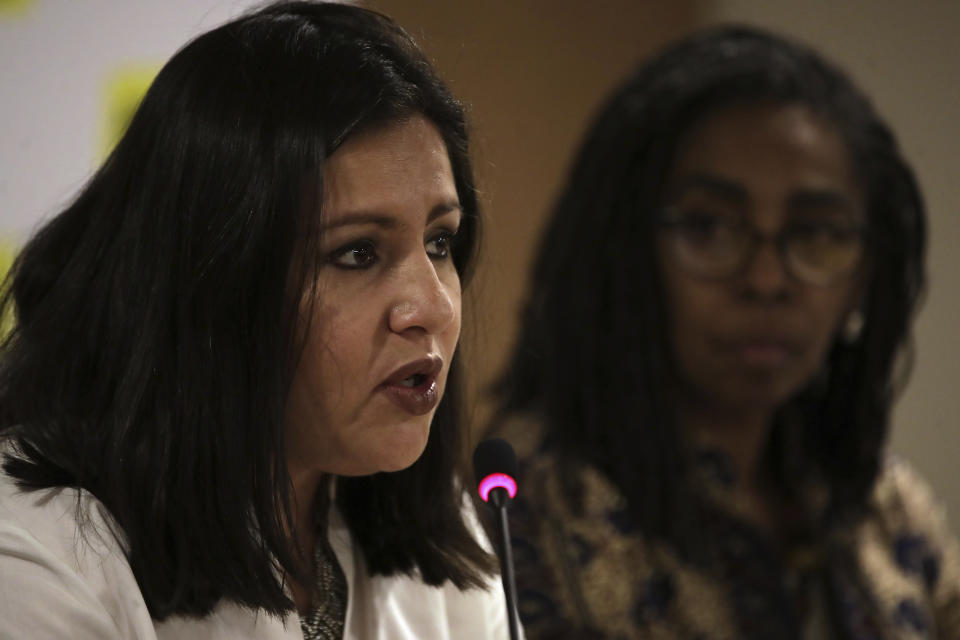 International Amnesty's Americas Executive Director Erika Guevara-Rosas, left, sitting next to International Amnesty's Brazil Executive Director Jurema Werneck, speaks during a press conference in Brasilia, Brazil, Tuesday, May 21, 2019. Amnesty International is launching a campaign called "Brazil for Everyone" to present their criticisms of Jair Bolsonaro's "anti-human rights" agenda. (AP Photo/Eraldo Peres)