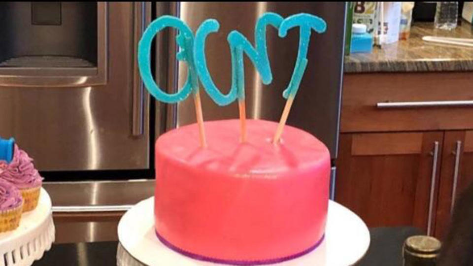 A two-year-old’s birthday party brought a room full of adults to laughter after they noticed that the birthday cake topper resembled a rude word. Photo: Reddit/randyfloyd37