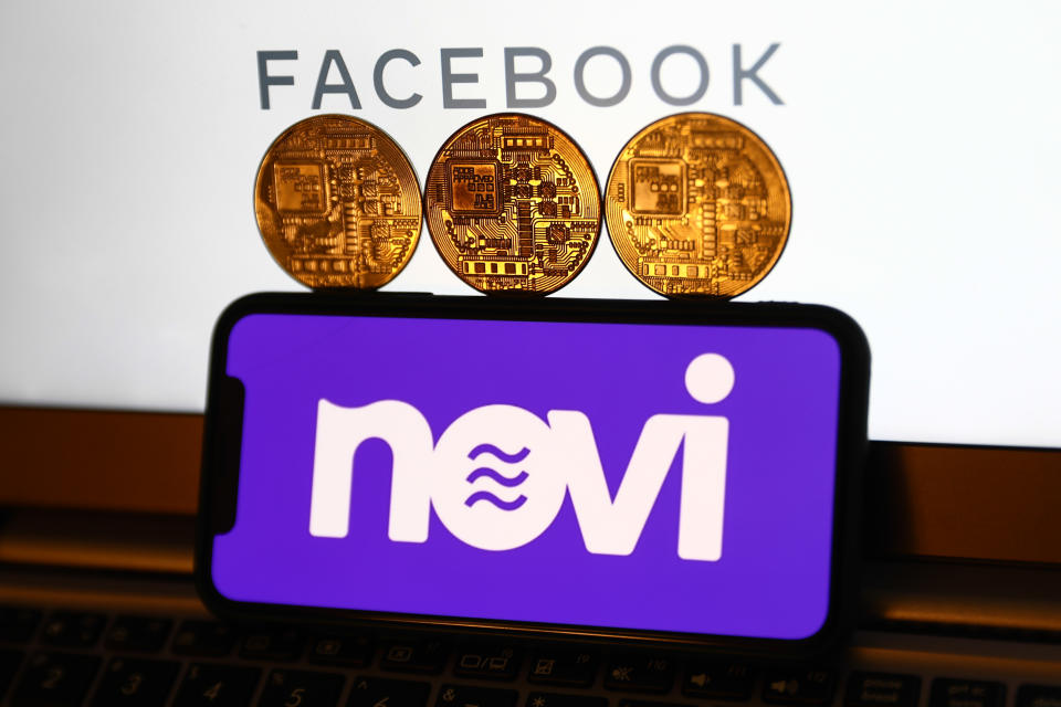 Novi logo displayed on a phone screen, representation of cryptocurrencies and Facebook company logo displayed on a laptop screen are seen in this illustration photo taken in Krakow, Poland on October 21, 2021. (Photo by Jakub Porzycki/NurPhoto via Getty Images)