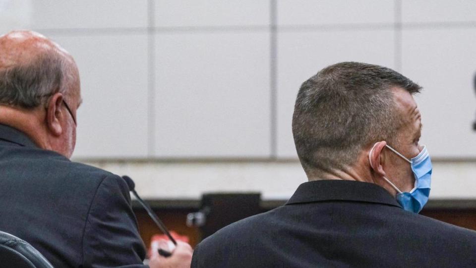 Attorney Robert Sanger, left, and his client Paul Flores listen to pretrial motions in the Kristin Smart murder case, at Monterey County Superior Court in Salinas on June 6, 2022.