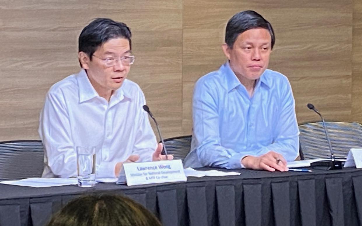 Minister of National Development Lawrence Wong (left) and Minister for Trade and Industry Chan Chun Sing during a briefing session on distribution of face masks to Singapore households. (PHOTO: Chia Han Keong/Yahoo News Singapore)