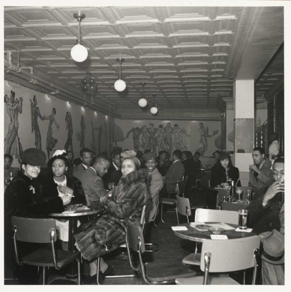 Patrons at tables at the Spot Café at 703 French Street in Wilmington on March 20, 1940.
