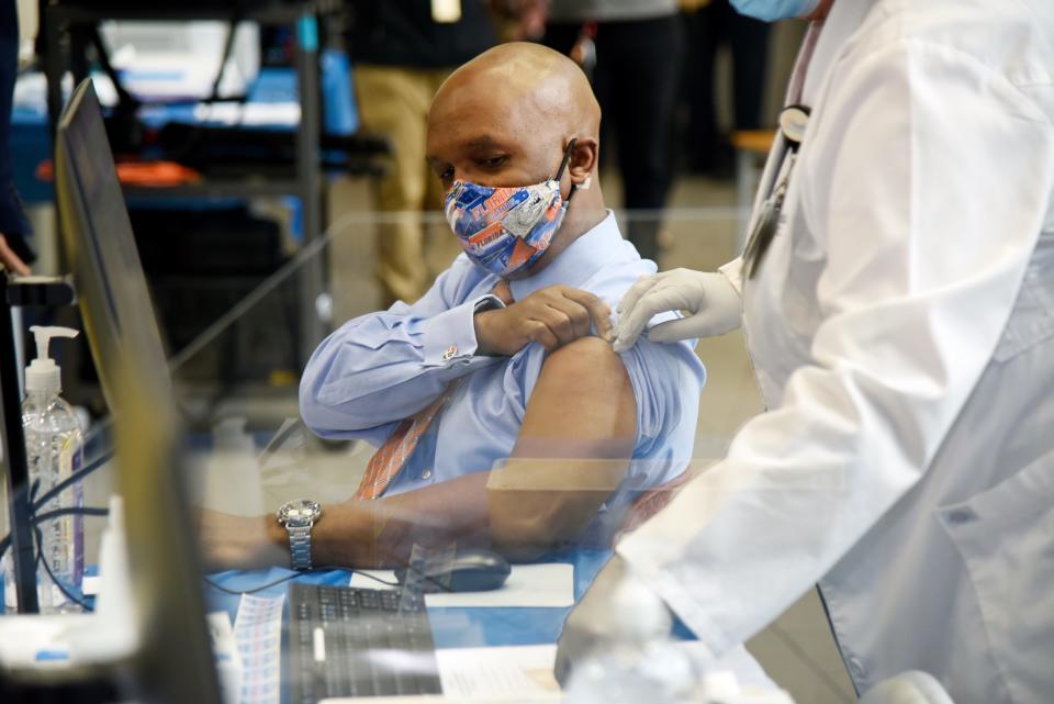 Dr. Leon L. Haley Jr., a board-certified emergency room physician, CEO of UF Health Jacksonville and dean of the UF College of Medicine – Jacksonville, is among the first in Florida to be vaccinated on Monday.