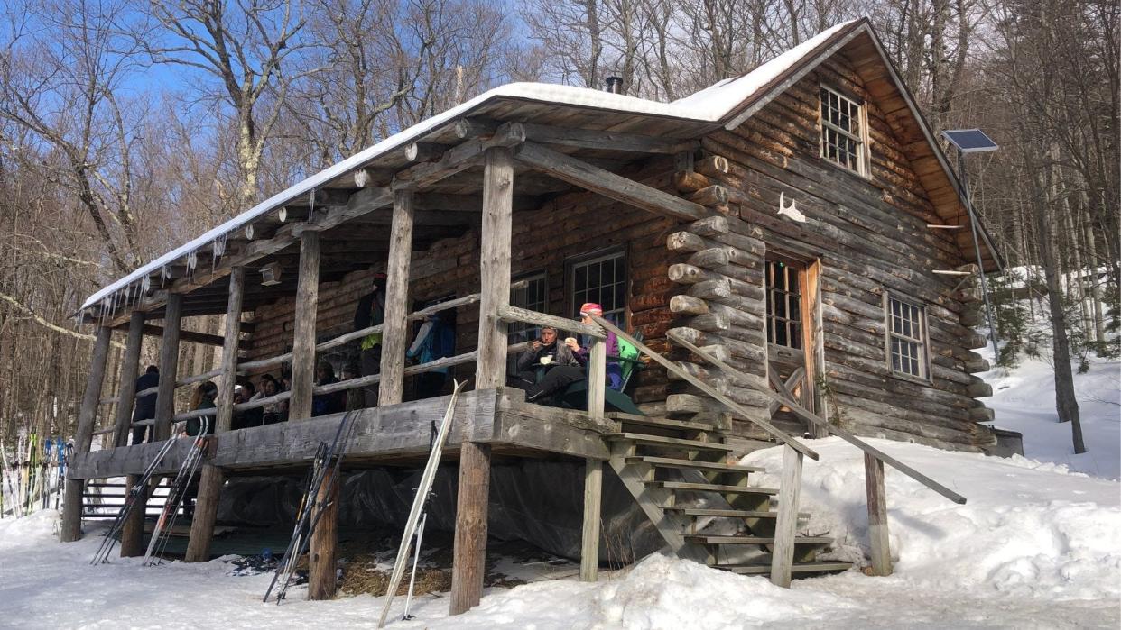 The rustic Slayton Pasture Cabin is about three miles from the Trapp Family Lodge outdoor center.
