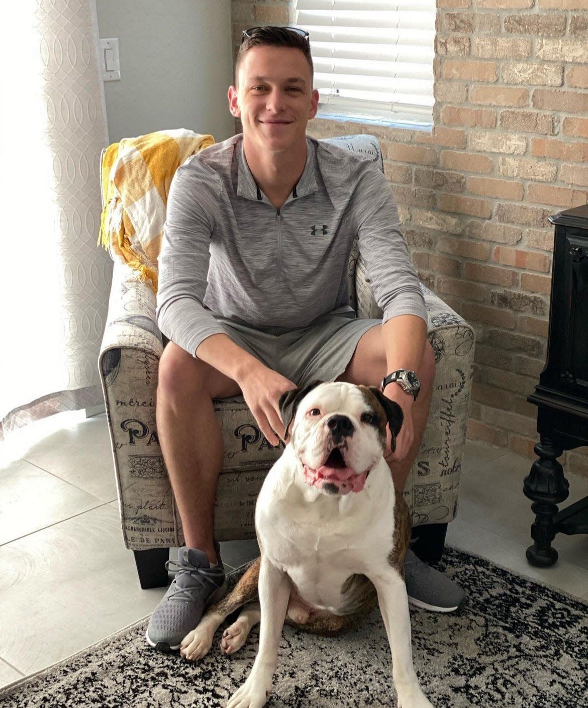 Alec Langen, photographed with his dog, was among the five U.S. Marines killed in a helicopter crash that was found on Feb. 7, 2024, in Pine Valley near San Diego.