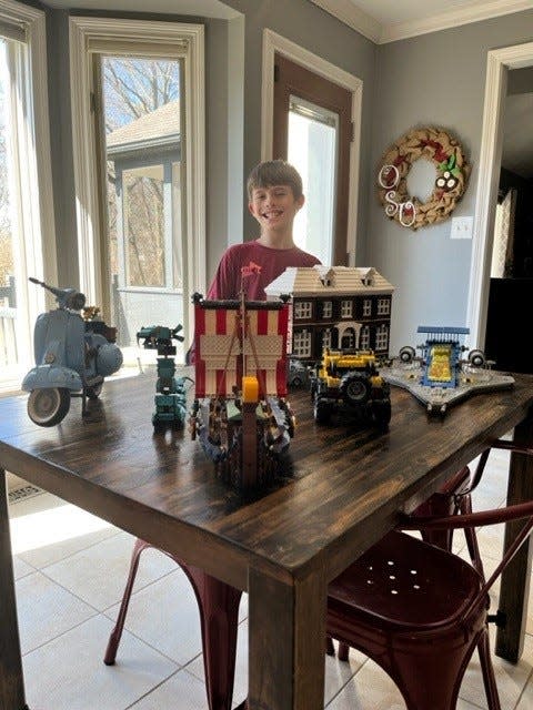 10-year-old Logan Nordahl of Powell is a Lego enthusiast and fan of Scott Brown's TikTok account who got a special tour of Brown's collection in Plain Township.