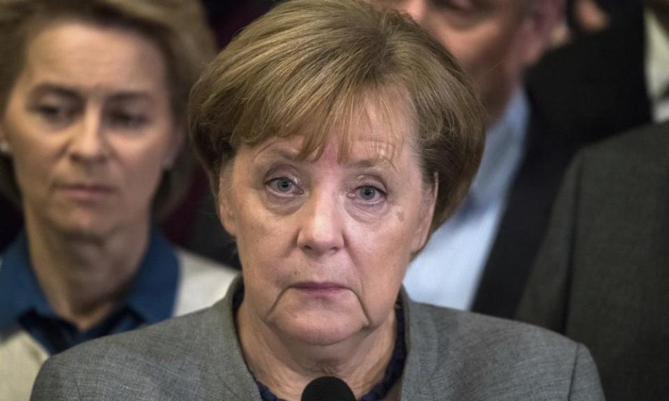 German chancellor Angela Merkel looking unhappy