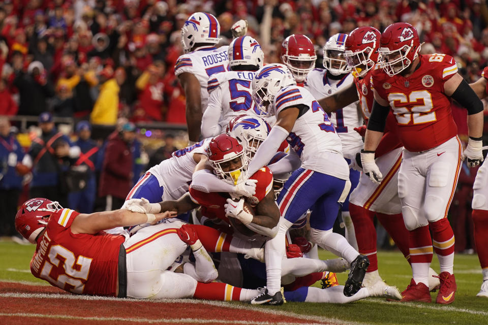 Kansas City Chiefs running back Jerick McKinnon (1) scores during the first half of an NFL football game against the Buffalo Bills Sunday, Dec. 10, 2023, in Kansas City, Mo. (AP Photo/Charlie Riedel)