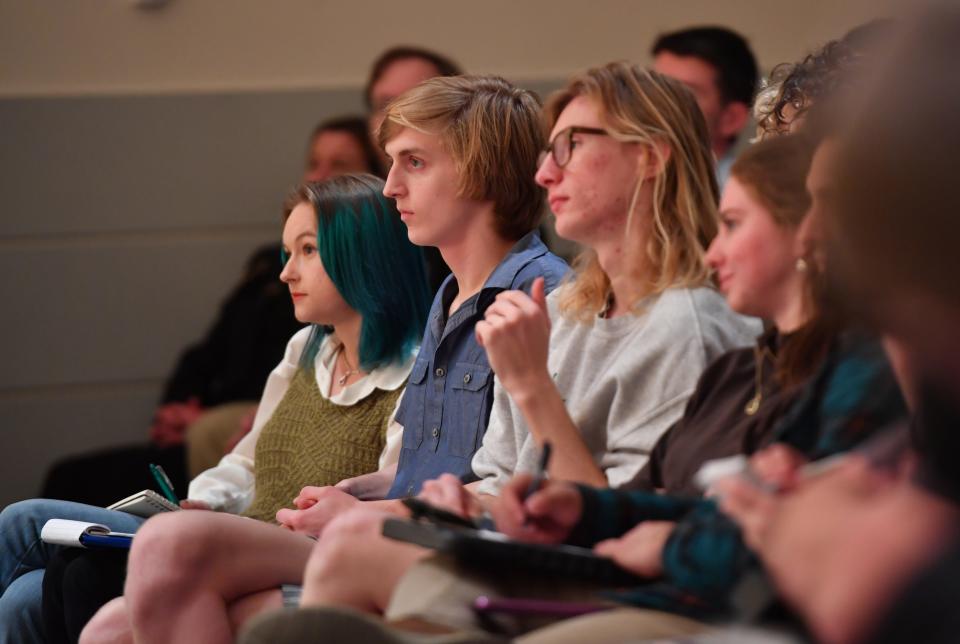 New College of Florida students listen as Christopher Rufo and Jason "Eddie" Speir speak about their new roles with the college during a meeting for students Wednesday afternoon on campus.