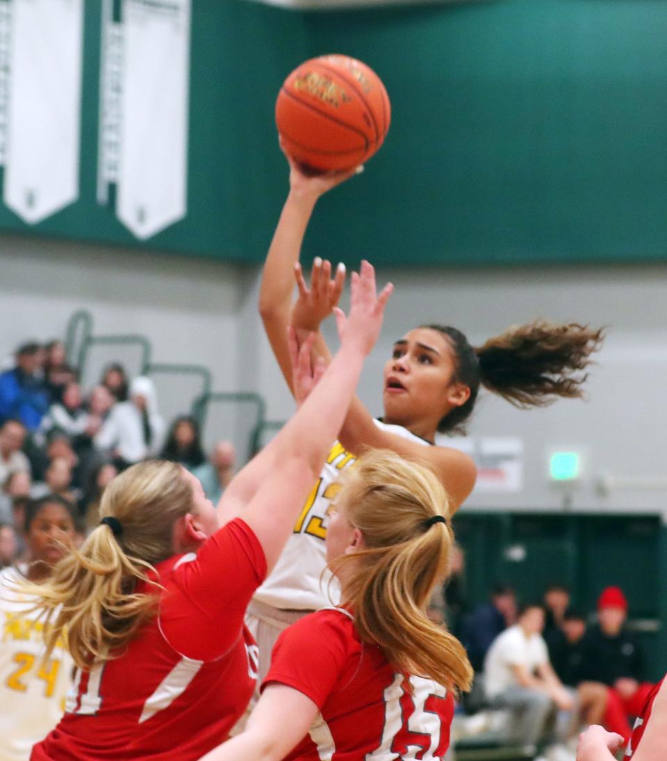 Panas' Sofia Tavarez (13) puts up a shot against Red Hook during the girls Class A regional semifinal at Yorktown High School March 5, 2024. Walter Panas won the game 63-30.