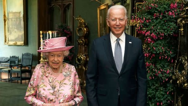 PHOTO: Queen Elizabeth with President Joe Biden in the Grand Corridor during their visit to Windsor Castle, June 13, 2021, in Windsor, England. (WPA Pool/Getty Images)