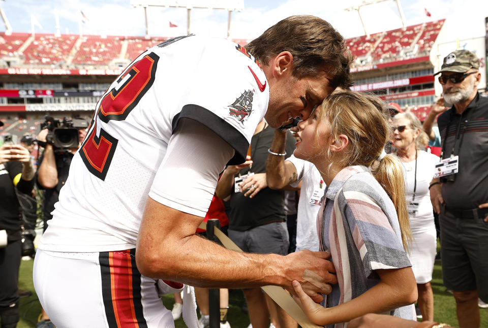 <p>Tom Brady and daughter Vivian share a sweet moment during the Tampa Bay Buccaneers' first home game of the season in Florida on Sept. 25.</p>