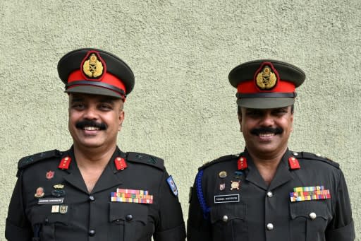 Twin Sri Lankan army generals Jayantha (L) and Pooraka (R) Seneviratne were among the thousands who turned up for the record attempt