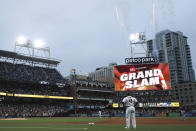 San Diego Padres' Manny Machado runs the bases after hitting a grand slam against the Atlanta Braves in the fifth inning of a baseball game Saturday, Sept. 25, 2021, in San Diego. (AP Photo/Derrick Tuskan)