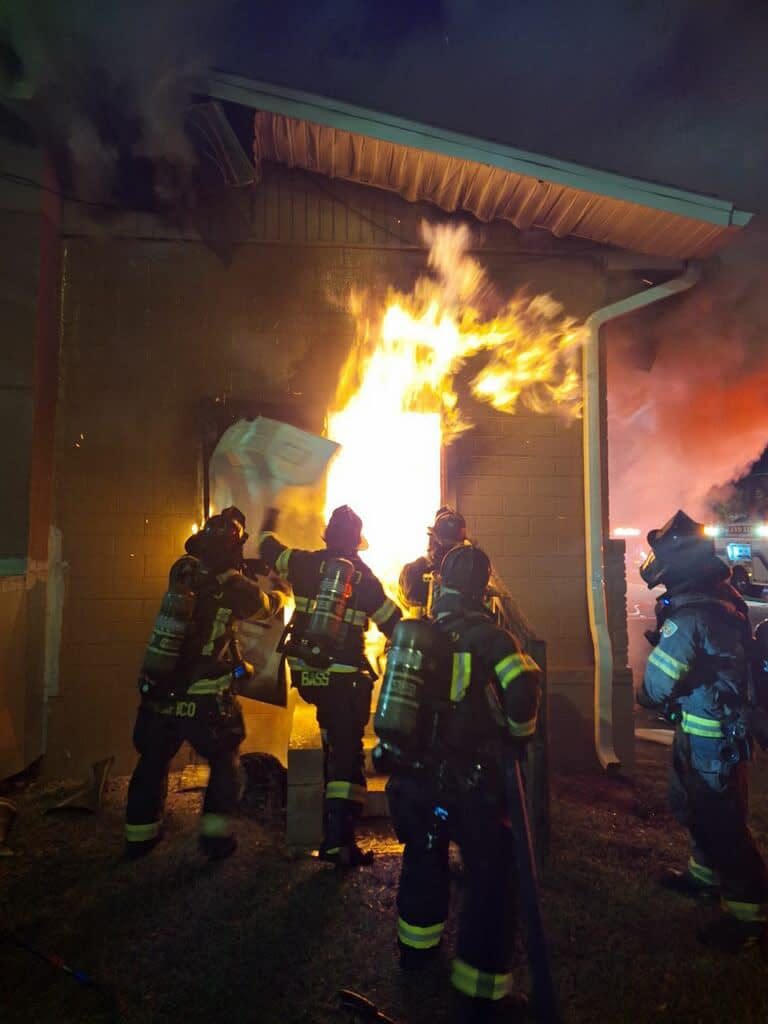 DeLand firefighters attempt to put out a fire at VFW Post 2380 just south of downtown DeLand Friday night.