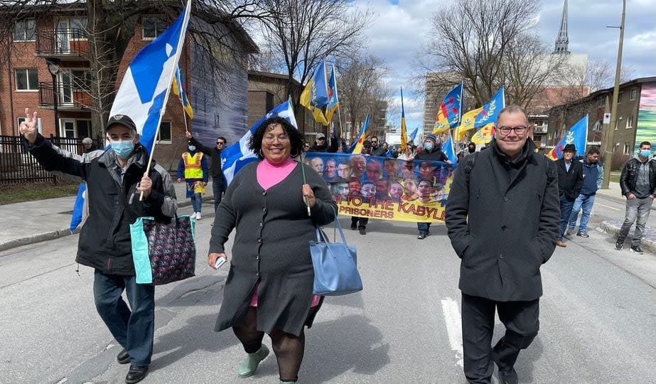 Bloc MP Mario Beaulieu, right, takes part in a rally in Montreal for the self-determination of Kabylia and the release of political prisoners in Algeria on April 16, 2022.  