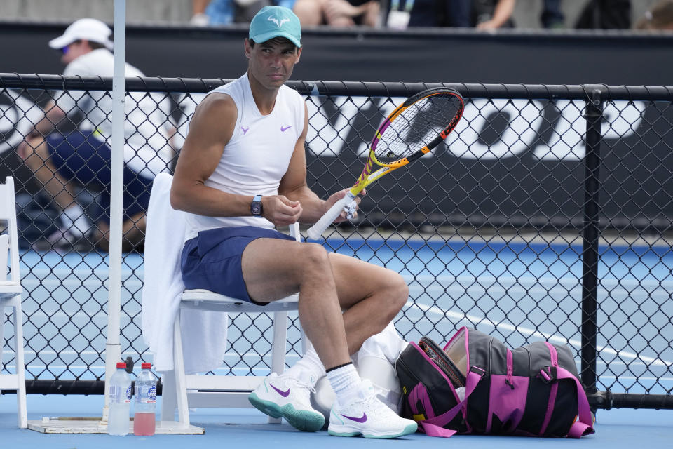 Rafael Nadal of Spain rest during a practice session at Melbourne Park at the Australian Open tennis championships in Melbourne, Australia, Saturday, Jan. 29, 2022. Nadal will play Russia's Daniil Medvedev on Sunday Jan. 30 in the men's singles final. (AP Photo/Mark Baker)