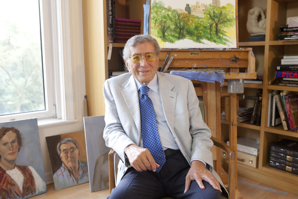 This Sept. 27, 2012 photo shows singer Tony Bennett posing for a portrait among his artwork at his studio in New York. Bennett is releasing his second duets album with various Latin musicians, "Viva Duets," on Monday, Oct. 22. (Photo by Amy Sussman/Invision/AP)