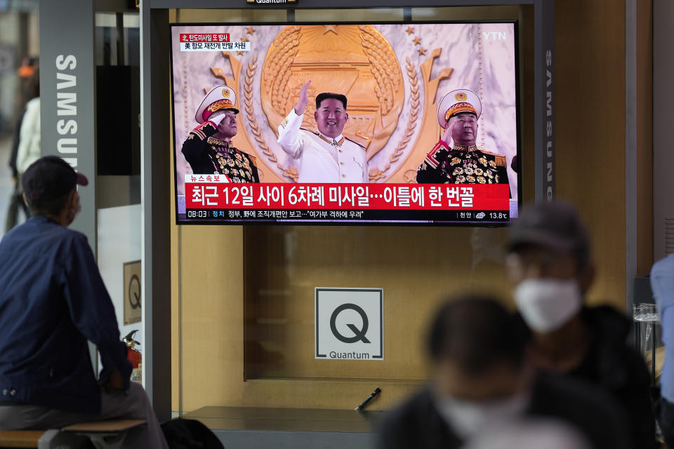 A TV screen showing a news program reporting about North Korea's missile launch with file footage of North Korean leader Kim Jong Un, is seen at the Seoul Railway Station in Seoul, South Korea, Thursday, Oct. 6, 2022. North Korea launched two ballistic missiles toward its eastern waters on Thursday, as the United States redeployed one of its aircraft carriers near the Korean Peninsula in response to the North's recent launch of a powerful missile over Japan. (AP Photo/Lee Jin-man)