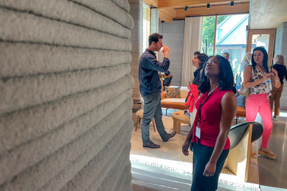 Journalists tour House Zero, a 2,000-square-foot, three-bedroom, 2.5-bath home in Austin, Texas, featuring Austin-based ICON’s 3D-printed construction system, on Tuesday, June 18, 2024.