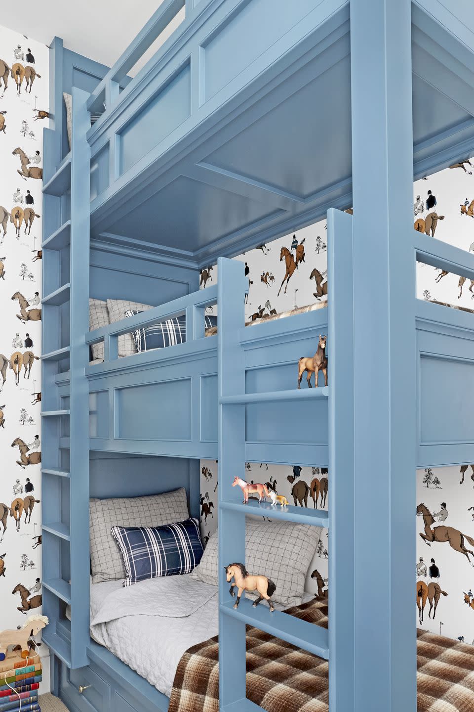 <p>When life gives you a less than massive bunkroom, you go up! Designer <a href="https://www.countryliving.com/home-design/house-tours/g24851295/caitlin-wilson-oregon-home/" rel="nofollow noopener" target="_blank" data-ylk="slk:Caitlin Wilson's family ranch;elm:context_link;itc:0;sec:content-canvas" class="link ">Caitlin Wilson's family ranch</a> boasts an adorable boys's bedroom featuring triple bunks painted <a href="https://www.benjaminmoore.com/en-us/color-overview/find-your-color/color/hc-158/newburg-green" rel="nofollow noopener" target="_blank" data-ylk="slk:Newburg Green by Benjamin Moore;elm:context_link;itc:0;sec:content-canvas" class="link ">Newburg Green by Benjamin Moore</a>. <br></p>