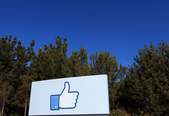 A giant "like" icon made popular by Facebook is seen at the company's new headquarters in Menlo Park, California January 11, 2012. The 57-acre campus, which formerly housed Sun Microsystems, features open work spaces for nearly 2,000 employees on the one million square foot campus, with room for expansion. Picture taken January 11, 2012. REUTERS/Robert Galbraith  (UNITED STATES - Tags: SCIENCE TECHNOLOGY MEDIA TPX IMAGES OF THE DAY) - GM1E81D0BPN01