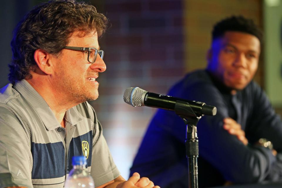 Milwaukee Brewers chairman and principal owner Mark Attanasio, left,  talks about  Giannis  Antetokounmpo, right,  becoming an investor in the team at the American Family Field.