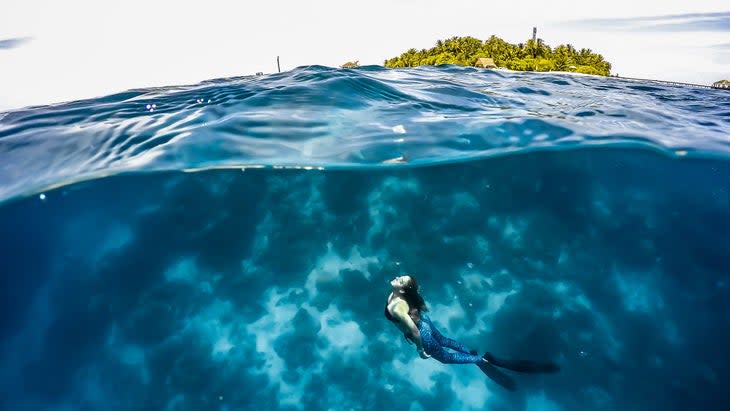 swimming in the Maldives