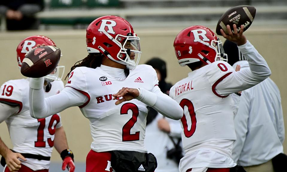 Nov 12, 2022; East Lansing, Michigan, USA; Rutgers Scarlet Knights quarterbacks Gavin Wimsatt (2) and Noah Vedral (0) throw before playing the Michigan State Spartans  at Spartan Stadium. Mandatory Credit: Dale Young-USA TODAY Sports