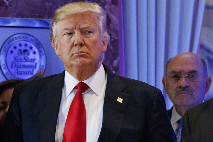 Then-President-elect Donald Trump stands next to Allen Weisselberg at a news conference in the lobby of Trump Tower in 2017.Donald Trump (Evan Vucci / AP)