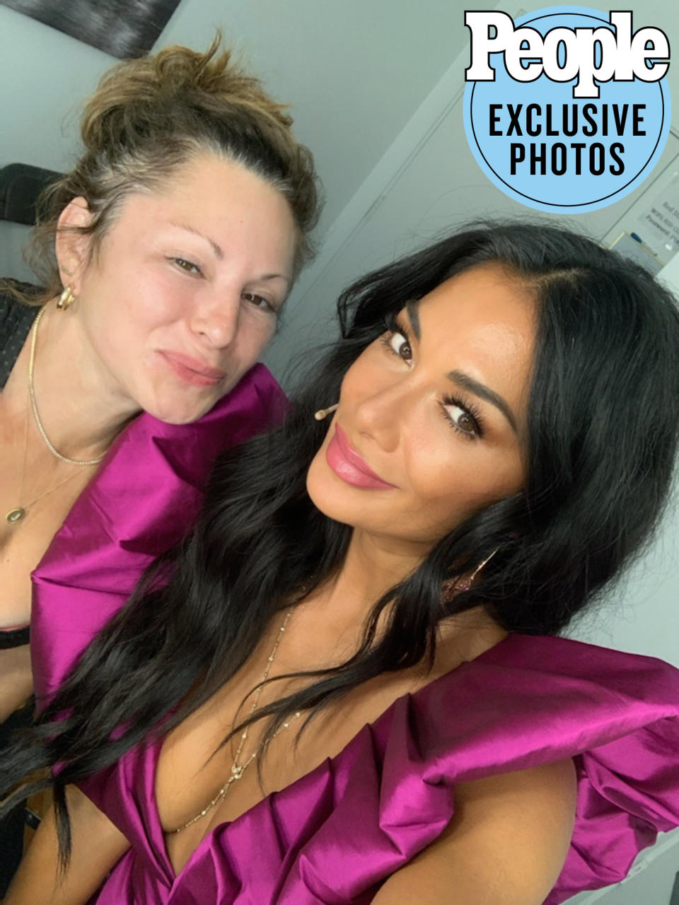 <p>Nicole's stylist, celebrity favorite <a href="https://www.instagram.com/highheelprncess/?hl=en" rel="nofollow noopener" target="_blank" data-ylk="slk:Jessica Paster;elm:context_link;itc:0;sec:content-canvas" class="link ">Jessica Paster</a>, tells PEOPLE that she "wanted to go dramatic and sexy" with this fuchsia Ronny Kobo dress. "I love the fun play on color in this look. On Nicole's skin tone this was such a great color. I love the Christian Louboutin shoes that add another dimension in this look with the interesting pattern."</p> <p>Paster accessorized with Carbon and Hyde rings, Jacquie Aiche earrings and body chains and undergarments by Nippies.</p>