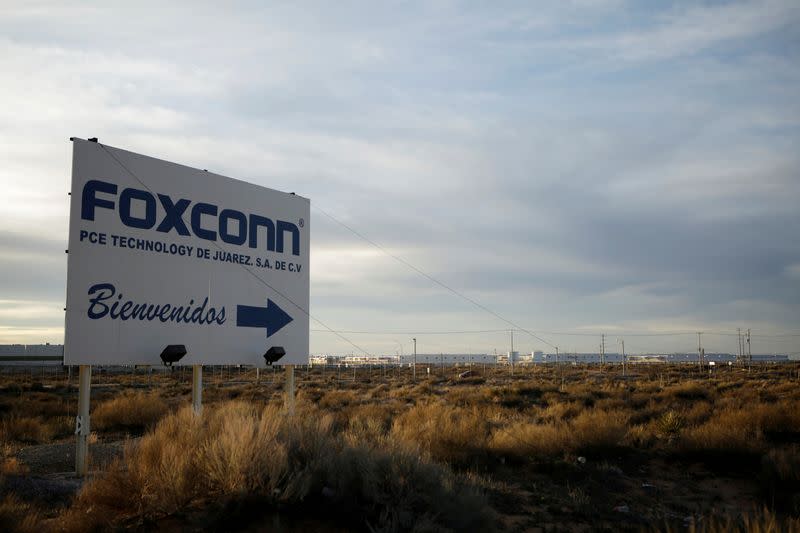 FILE PHOTO: A sign announces the manufacturing complex of Foxconn PCE Technology, in Ciudad Juarez