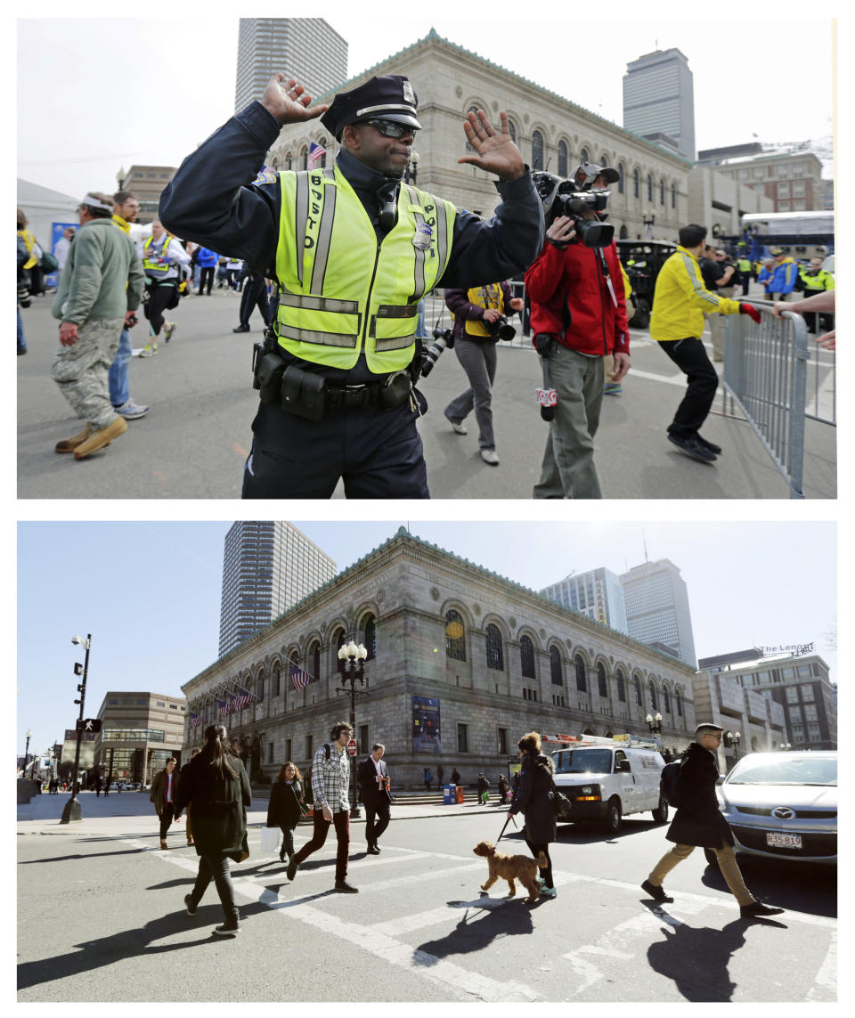 This combination of April 15, 2013 and April 2, 2014 photos show a police officer clearing Boylston Street following a bomb blast near the finish line of the 2013 Boston Marathon, and pedestrians crossing at the same corner nearly a year later in Boston. (AP Photo/Charles Krupa)
