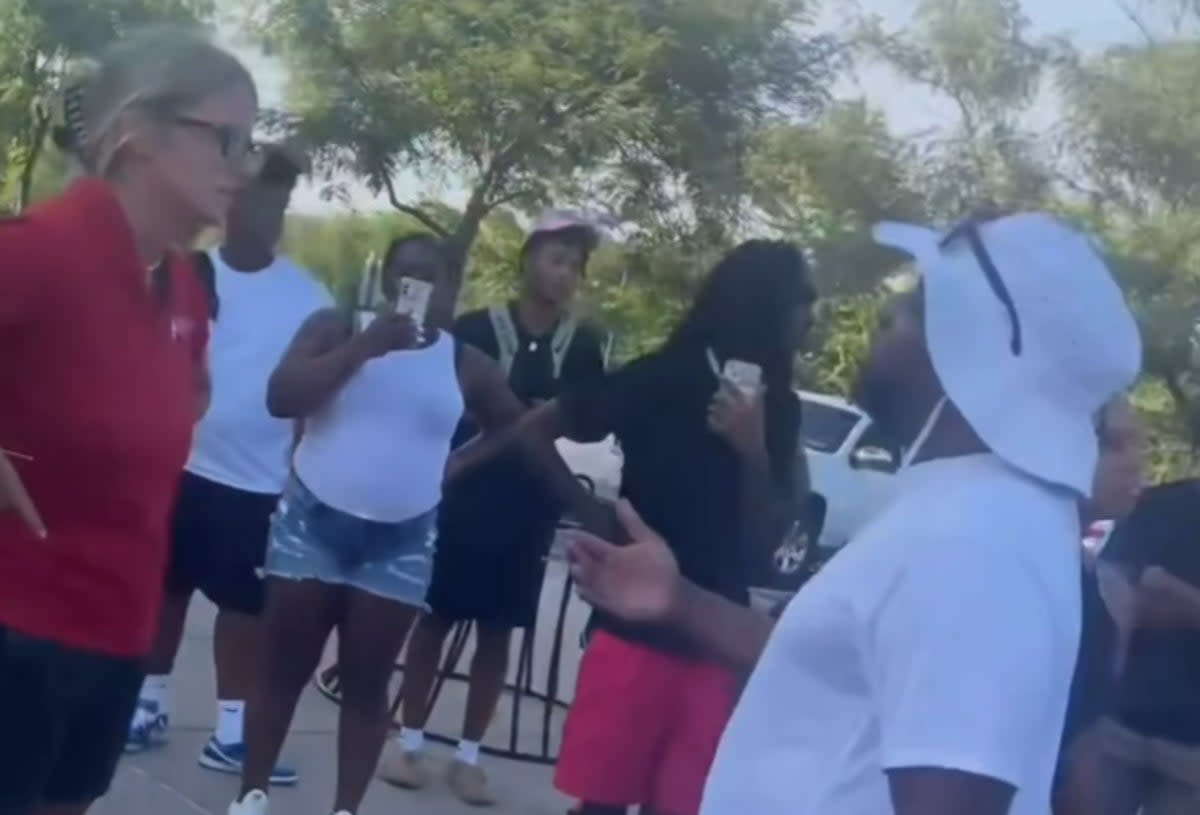 A moment during a confrontation between party attendees and a park official at the water park (Screengrab/TikTok/@kansascitydiscover)