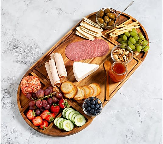 <p><a href="https://go.redirectingat.com?id=74968X1596630&url=https%3A%2F%2Fwww.qvc.com%2FCountry-Living-Magnetic-Acacia-Charcuterie-Board.product.K85461.html&sref=https%3A%2F%2Fwww.countryliving.com%2Fshopping%2Fgifts%2Fg22666197%2Fbest-thanksgiving-gifts%2F" rel="nofollow noopener" target="_blank" data-ylk="slk:Shop Now;elm:context_link;itc:0;sec:content-canvas" class="link ">Shop Now</a></p><p>Magnetic Acacia Charcuterie Board</p><p>qvc.com</p><p>$55.00</p>