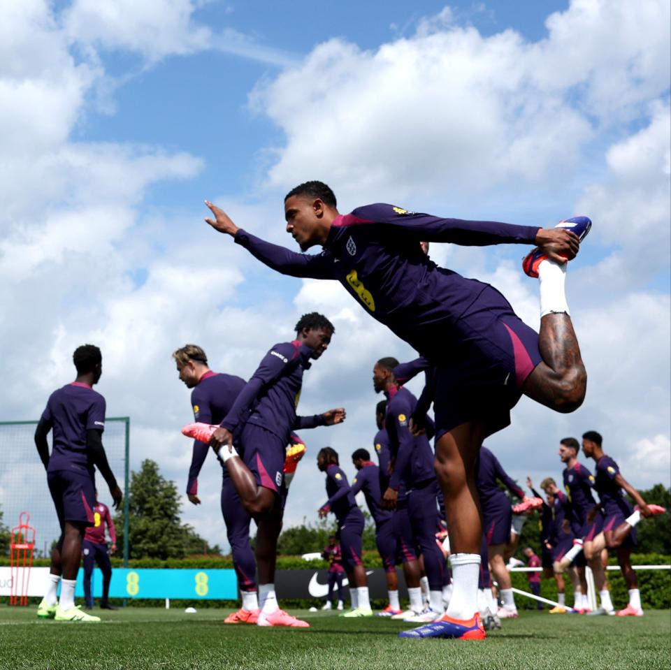 Ezri Konsa stretches before England training on Thursday (The FA via Getty Images)