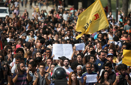 FILE PHOTO: People protest in front of the National Museum of Brazil in Rio de Janeiro, Brazil September 3, 2018. REUTERS/Pilar Olivares/File Photo