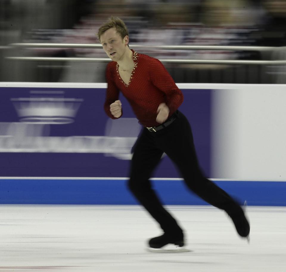 Ross Miner performs during the men's free skate competition at the U.S. Figure Skating Championships, Sunday, Jan. 22, 2017, in Kansas City, Mo. (AP Photo/Charlie Riedel)