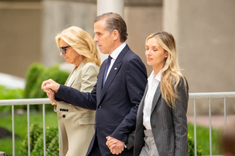 Hunter Biden walks from federal court with his wife, Melissa Cohen Biden, and first lady Jill Biden after being found guilty on federal gun charges earlier this month in Wilmington, Del. File Photo by David Muse/UPI
